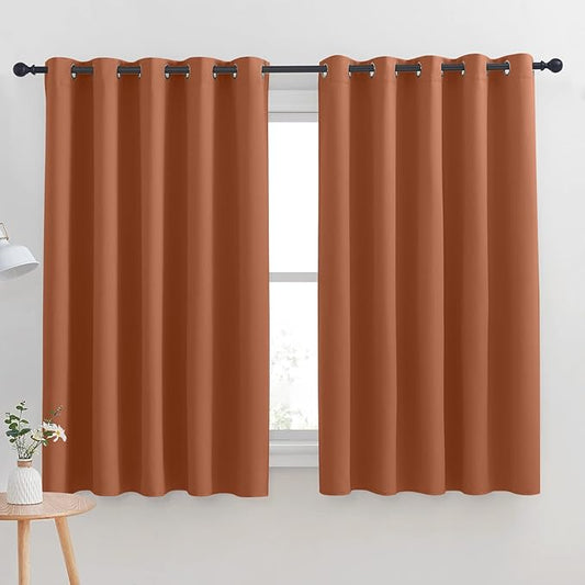 NICETOWN Thermal Insulated Burnt Orange Blackout Curtains for Bedroom, Window Treatment Solid Grommet Room Darkening Drape Panels for Bedroom (Set of 2, 70 by 63 inches Long)
