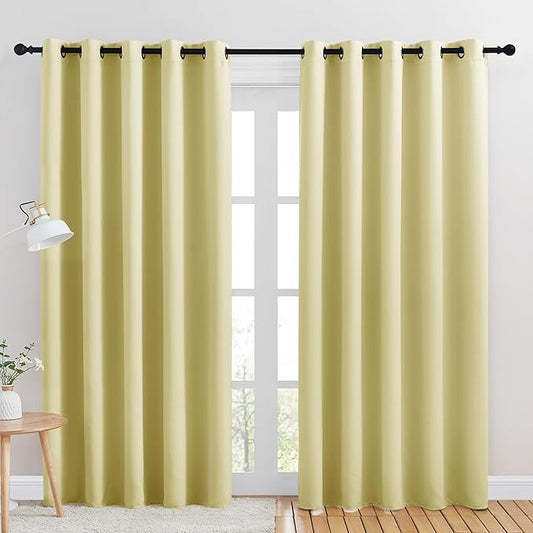NICETOWN Blackout Draperies Curtains for Kids Room, Paler Yellow, Set of 2, 70 by 84 inches, Window Treatment Thermal Insulated Solid Grommet Blackout Drape Panels for Bedroom